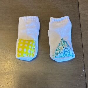 Lovevery Rattle White Socks with Yellow and Blue Patterns